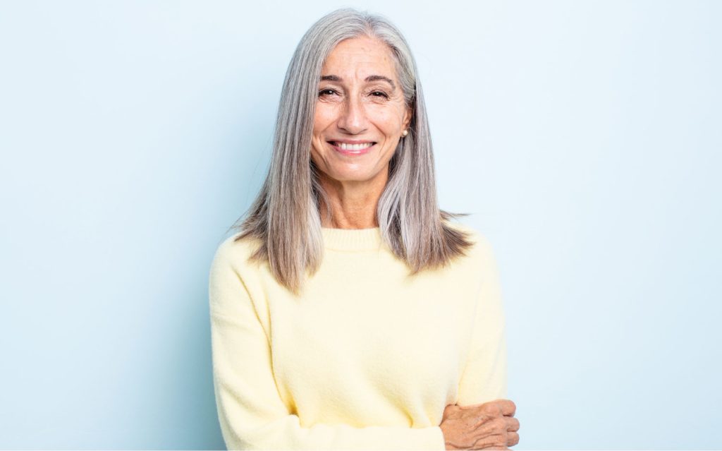 Elderly Woman Smiling After Getting Tooth Crown In Shelby Township, MI