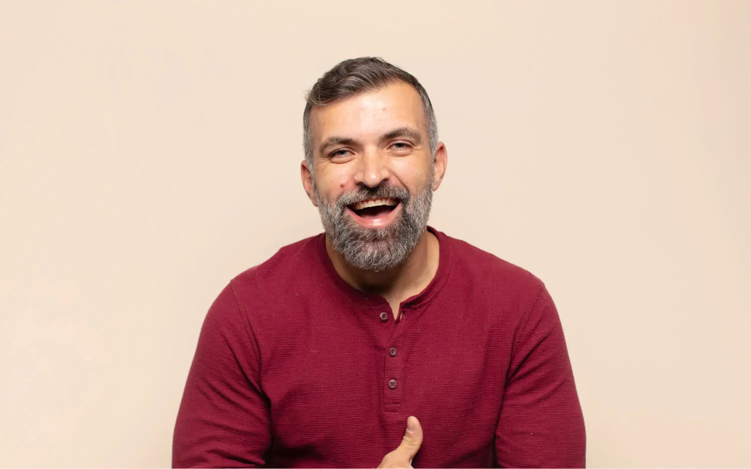 Person Smiling Confidently After Dental Bridge Treatment In Shelby Township, MI