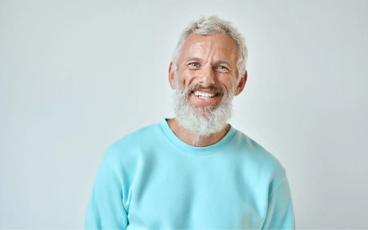Man Smiling Confidently After Dental Implant Treatment In Shelby Township, MI
